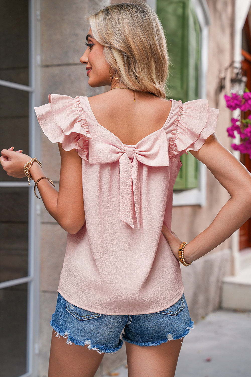 Ladies pink bow blouse